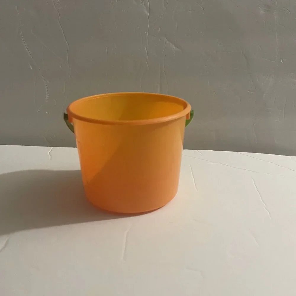 Small Orange Pail with Green Handle